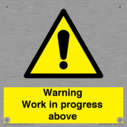 gender-neutral-construction-warning-sign-warning-work-in-progress-above-with-exc~